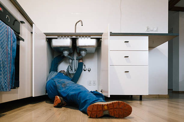 Professional Drain Cleaning technician working in Dana, KY